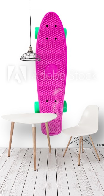 Picture of Pink plastic skateboard isolated on white background